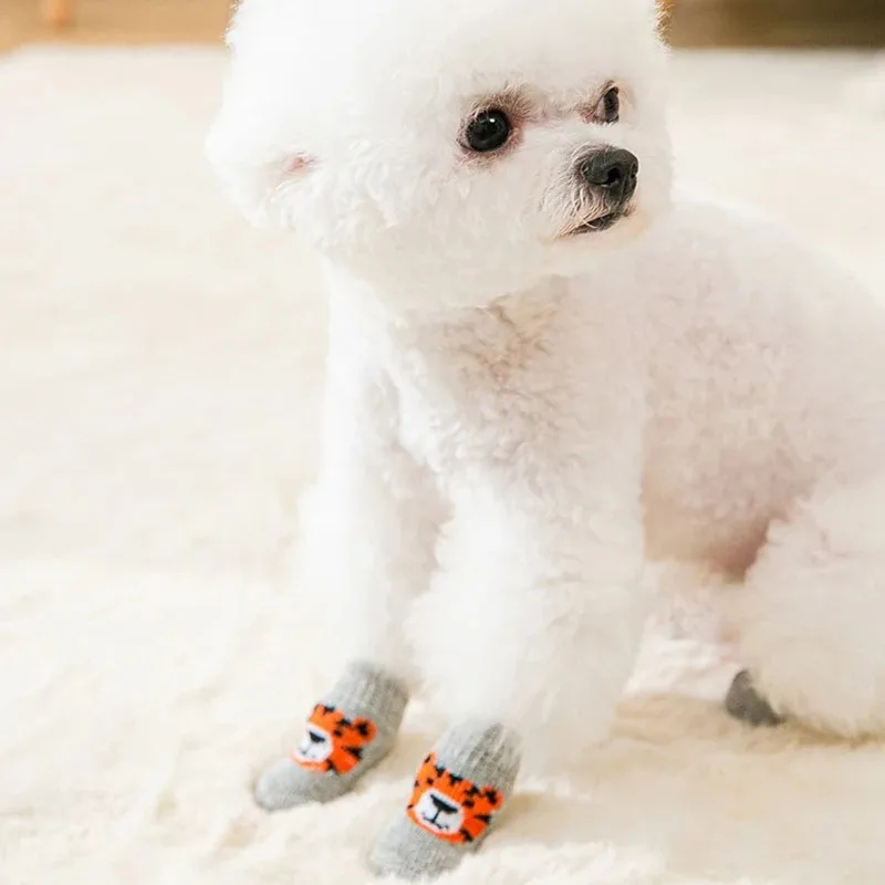 4 قطع من جوارب الكلاب الشتوية  - مراجعة Dog Booties Paw Protector وسعره